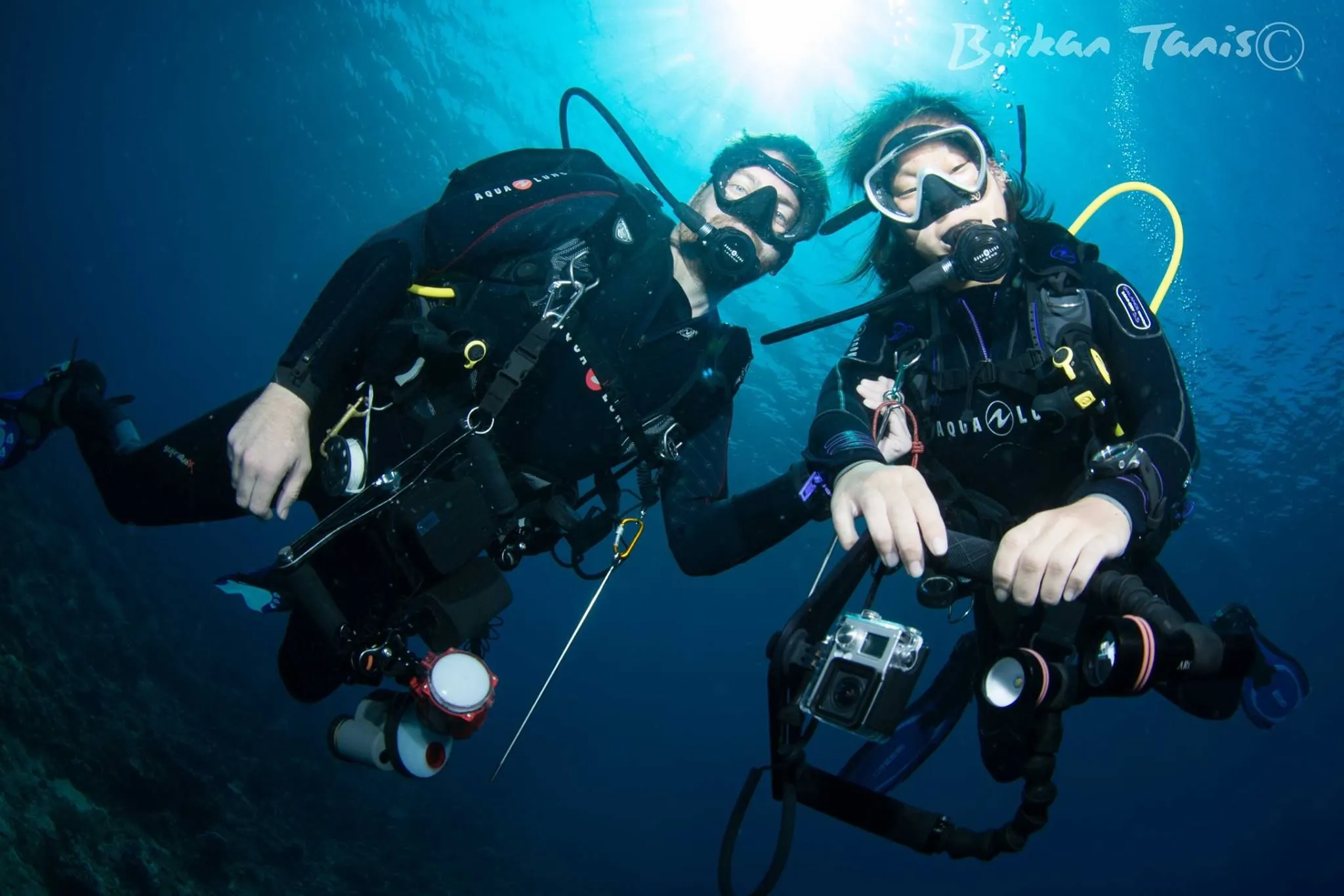 Diver photographer with two strobes