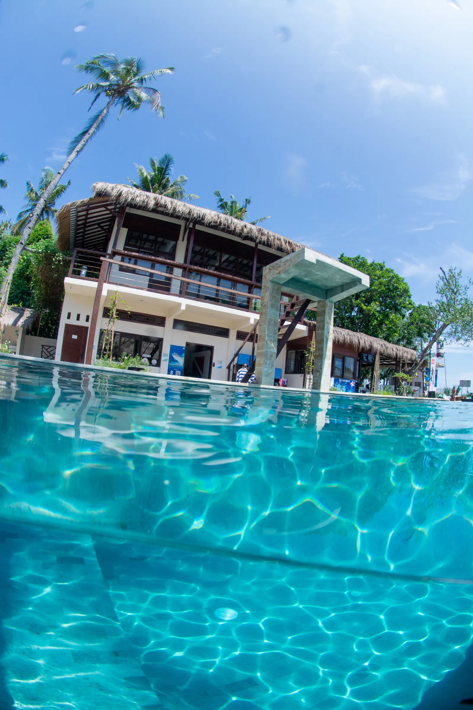Split-shot pool with resort behind