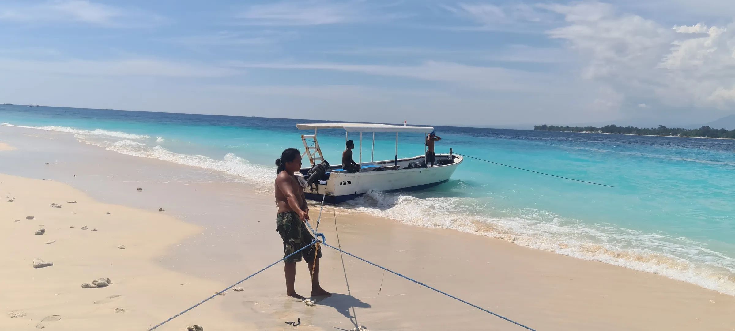 Outrigger pulled up on the sand