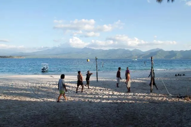 Beachgoers on white sand