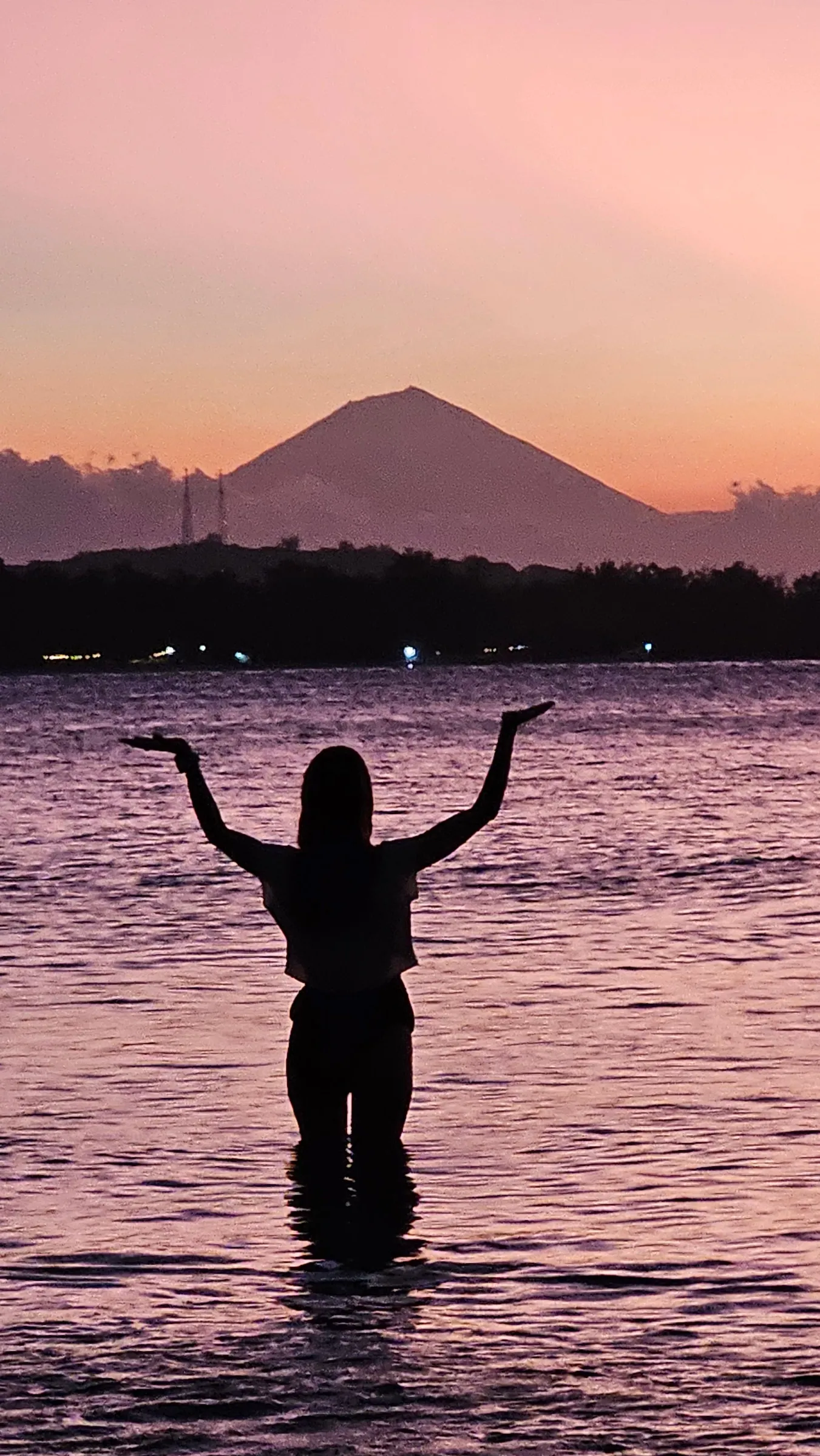 Silhouette dancing at sunset
