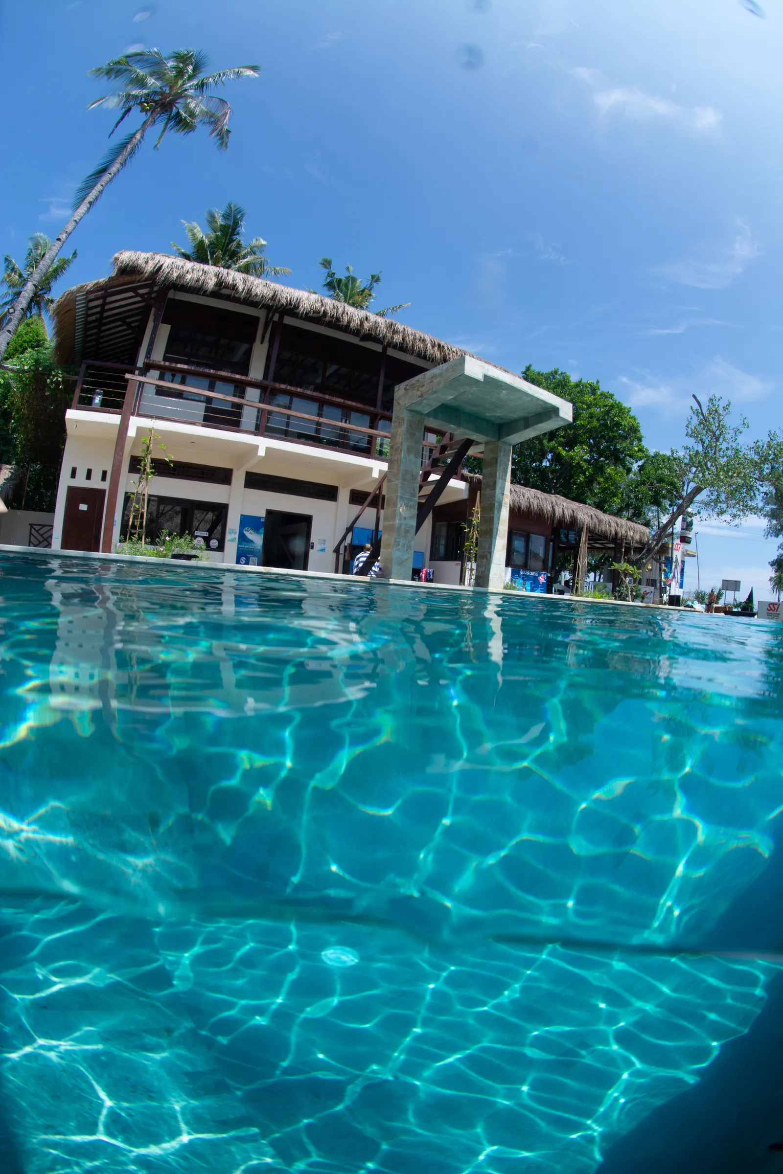 Split-shot of dive centre -side pool